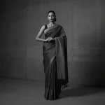 A Powerful Indian Woman in a Monochromatic Saree Statement | gemini prompt trending